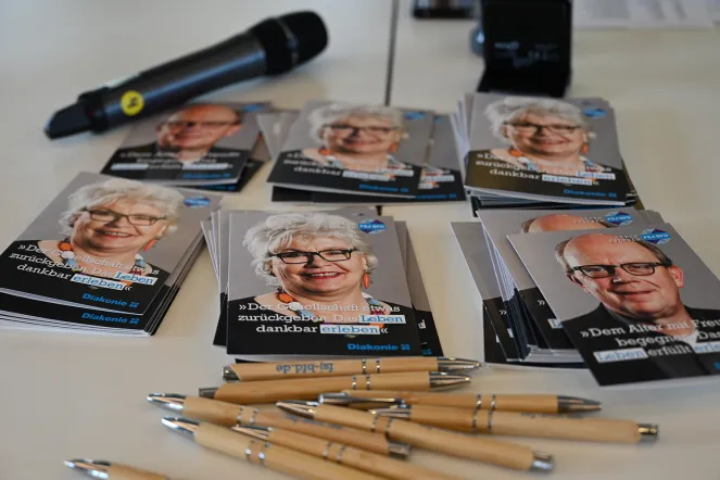 Werbematerial bei der Veranstaltung zu den Begegnungslots*innen