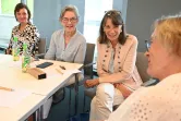 Teilnehmende tauschen sich aus bei der Veranstaltung zu den Begegnungslots*innen